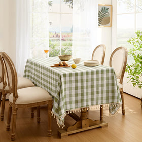 Softalker sage plaid dining tablecloth creates a warm, inviting setting.