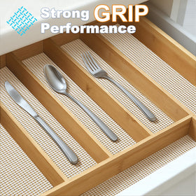 Songgrey liner installed in a kitchen drawer keeps utensils from sliding