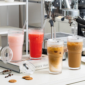 SoulTimes clear glass tumbler shows ribbed floral detail for elegant sipping.