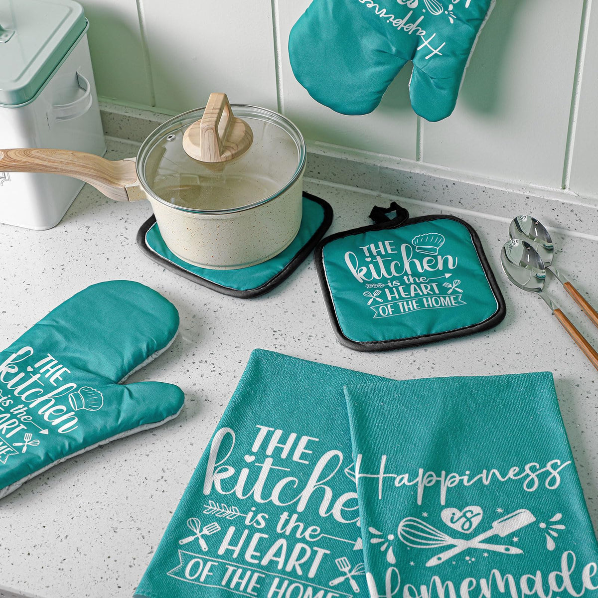 Sratte teal kitchen decor set unifies style for everyday cooking spaces.