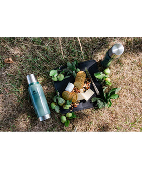 Stanley Classic bottle featuring a collapsible handle for easy transport on trips