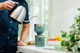 Pour-over brew action showing controlled extraction and aroma.
