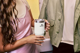 STANLEY mug features ergonomic handle and travel-friendly base for portability.