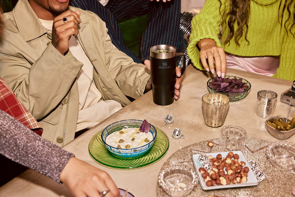 STANLEY Stainless steel mug highlights durable, eco-friendly construction.
