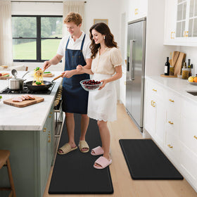 StepLively black kitchen mats blending with decor and offering versatile indoor use.