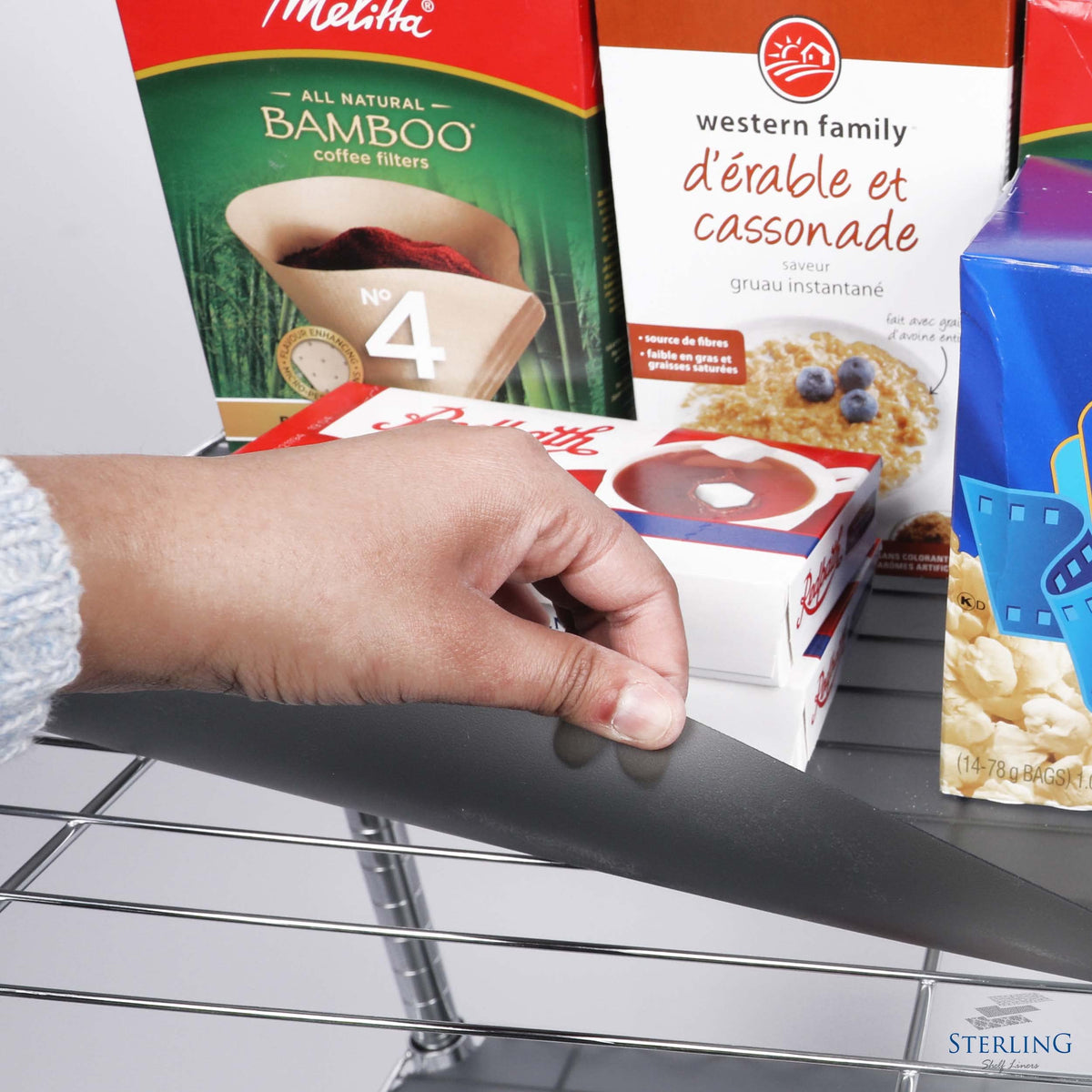 Sterling Shelf Liners organize pantry and garage cabinets with neat, protected shelves