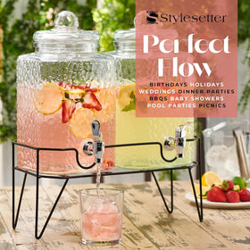 Includes extra spigot, tightening tool, chalkboard and chalk