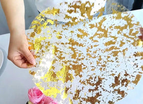 Sunlunckystar glamorous table decor with gold placemats for events.
