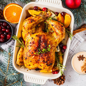 Sunvivi Roaster Oven liftable rack enabling easy turkey insertion.