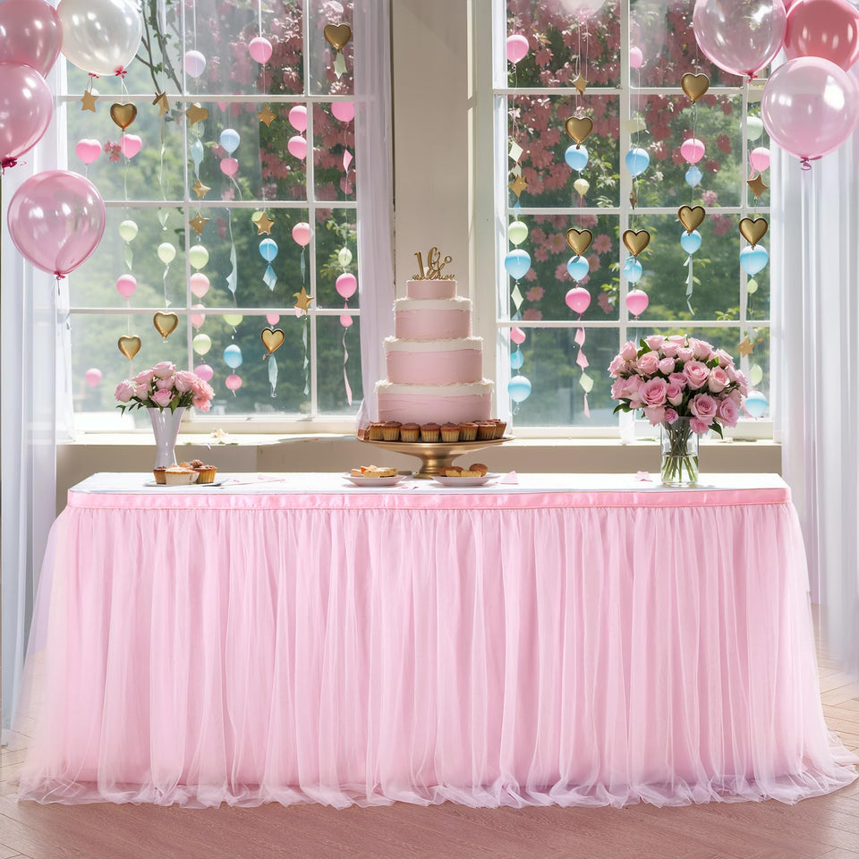 Suppromo 6ft pink tulle table skirt front view enhances party decor.