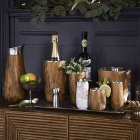 S'well Teakwood Wine Chiller fits most wine bottles for versatile chilling.