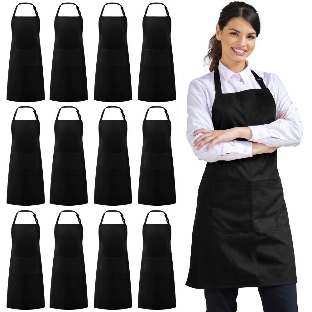 Syntus black bib apron with front pockets for easy utensil access.
