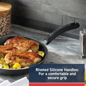 Thermo-Spot indicator on T-Fal Experience pan shows preheated status