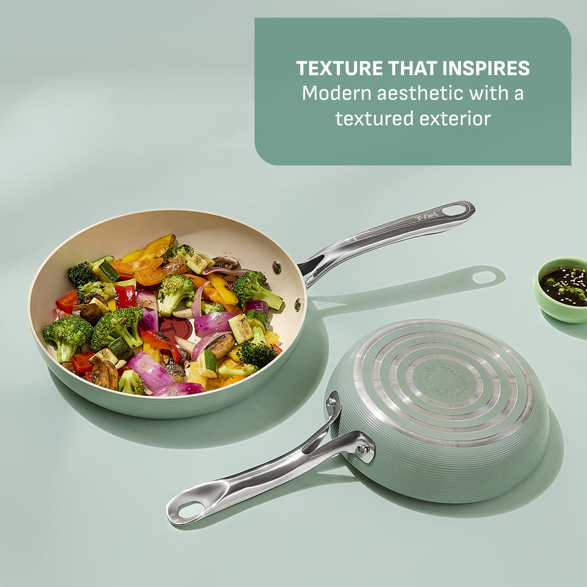 T-Fal Inspire 8-inch frypan nonstick coating detail highlights smooth release for effortless cooking.