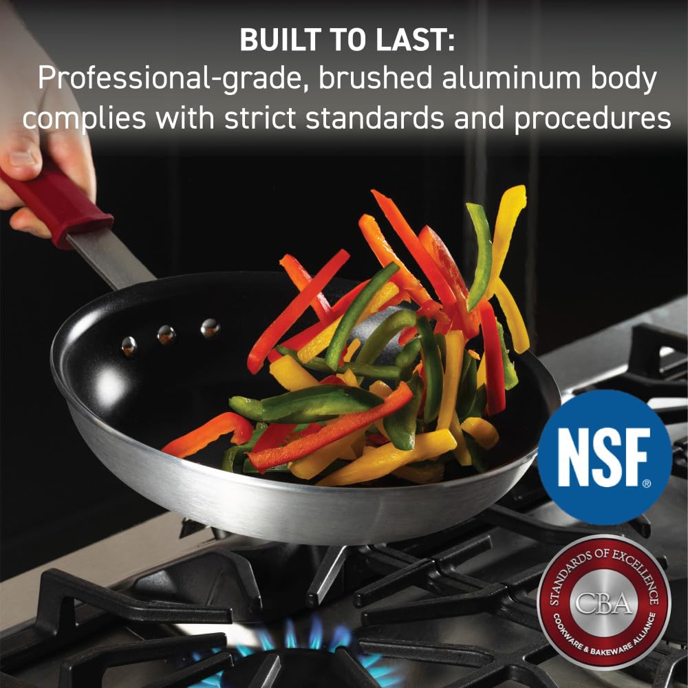 T-Fal VX3 fry pan close-up on stainless-steel handle and removable silicone sleeve