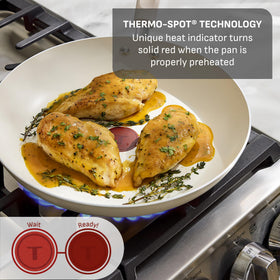 T-Fal Signature riveted bakelite handle provides a secure and comfortable grip.