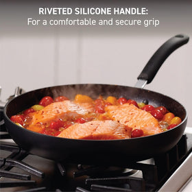 T-Fal titanium-reinforced nonstick coating promotes easy release and cleanup.