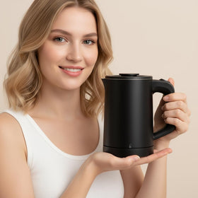 Tadcmey 600W kettle boiling water quickly for hot beverages.