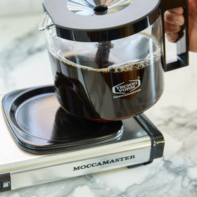 Technivorm Moccamaster KBGV Select quiet brewing in a calm kitchen.
