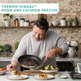 Riveted stainless-steel handle provides secure grip for comfortable cooking.