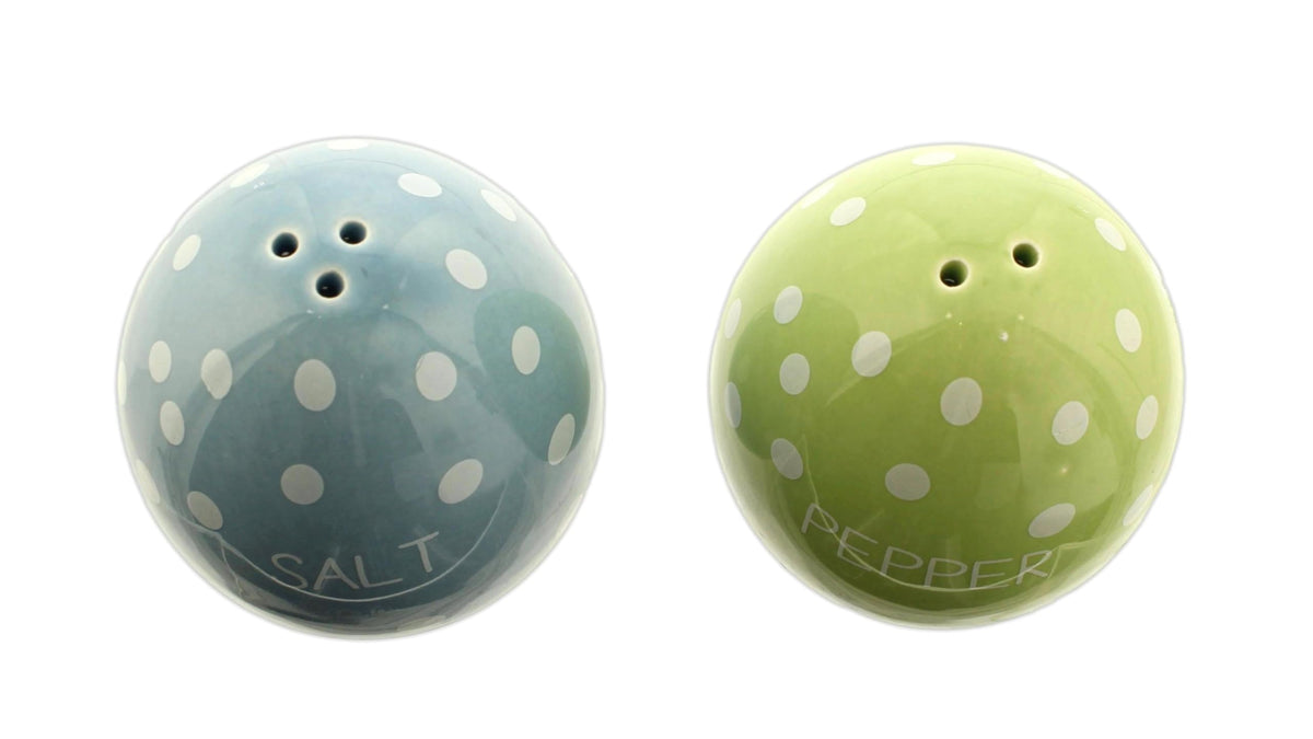 The Bridge Collection farmhouse-style salt and pepper set complements rustic kitchen decor.