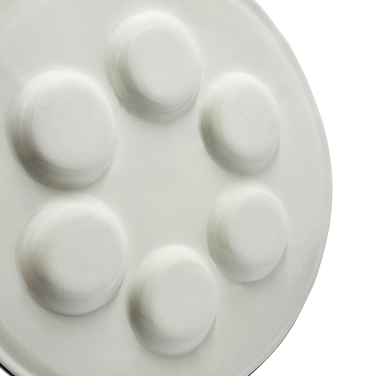 The Dreidel Company Seder Plate shows Hebrew and English labels for clear ritual guidance.