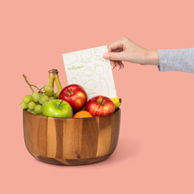 THE FRESHGLOW CO FreshPaper in a crisper drawer extends produce life in the fridge