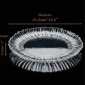 The Mask El Turko wave rim plate elevates cheeses and appetizers with stylish contrast.