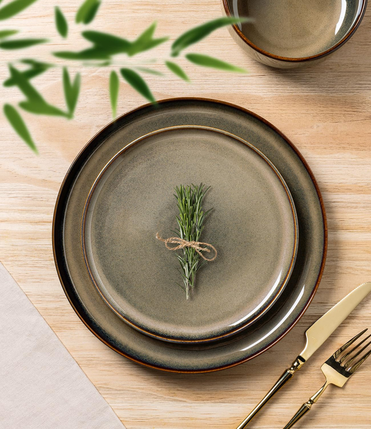 TheTerra salad plate in reactive glaze offering everyday elegance and easy stacking.