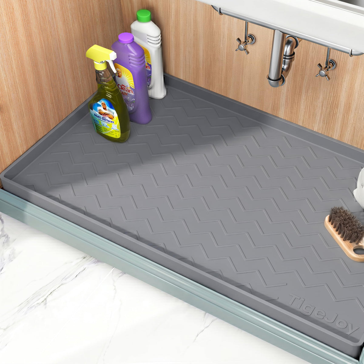TigeJoy under-sink mat provides waterproof protection for cabinets and floors.