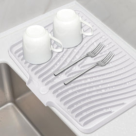 TIKNIK silicone drying mat shown in 16x12 size, ideal for air drying on countertops.