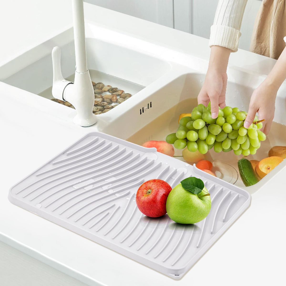 TIKNIK easy-clean silicone drying mat rolls up for simple storage.
