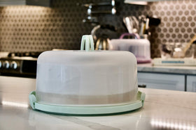 Top Shelf Elements round cake carrier base serves as a five-section serving tray.