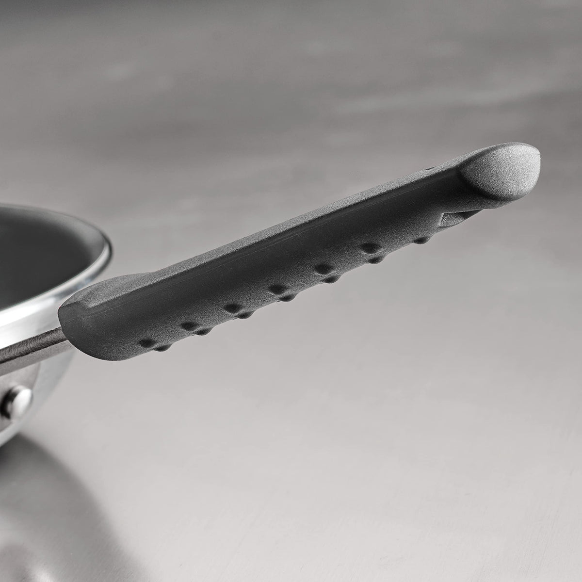 Tramontina Professional Fusion fry pan cast stainless steel handle with soft grip