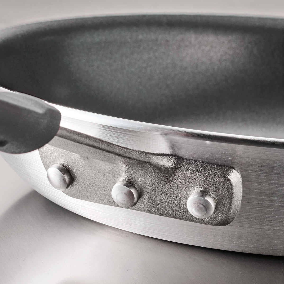 Tramontina Professional Fusion fry pan dishwasher-safe label on exterior
