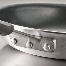 Tramontina Professional Fusion fry pan dishwasher-safe label on exterior