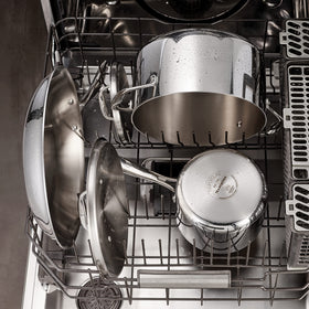 Dishwasher-safe Tramontina tri-ply frying pan ready for easy cleanup after cooking.