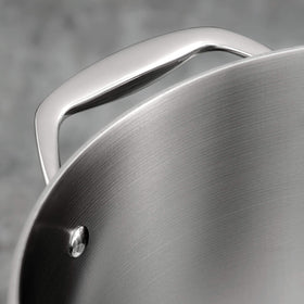 Tramontina tri-ply stock pot riveted handles for secure lifting