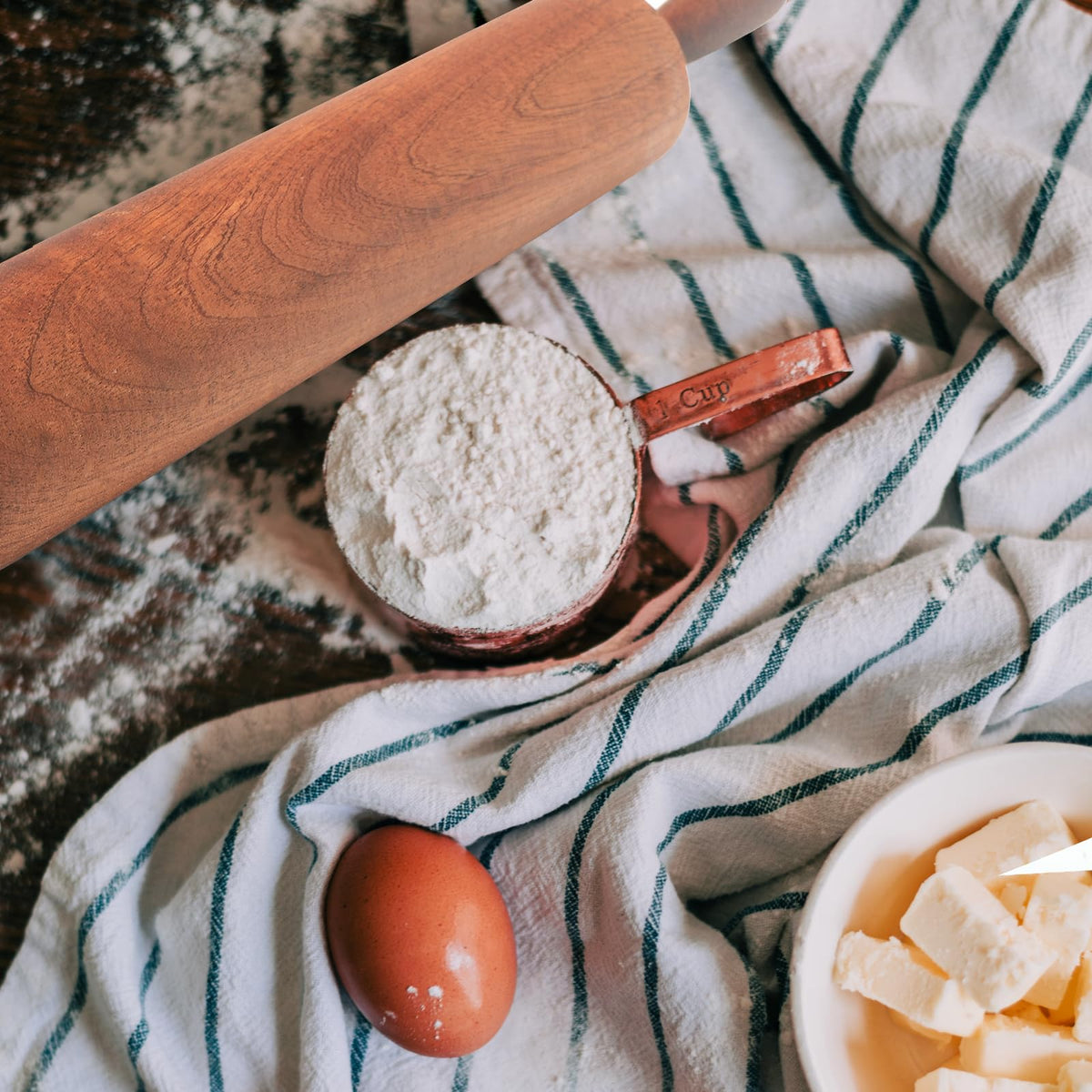 TUSIWIT rolling pin being hand-washed, promoting easy cleaning after use.