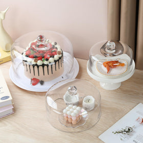 twakutwaku sturdy glass dome showcases pastries while protecting them from dust.