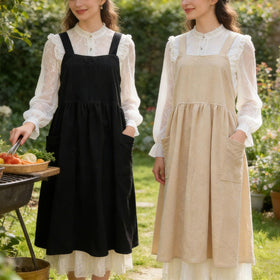 Uaussi unisex kitchen apron featuring cross-back for comfortable wear.