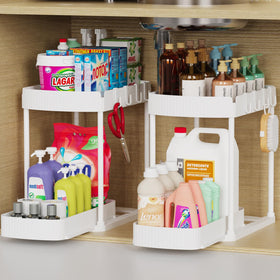 Ukeetap pull-out storage under sink offers easy access to essentials.