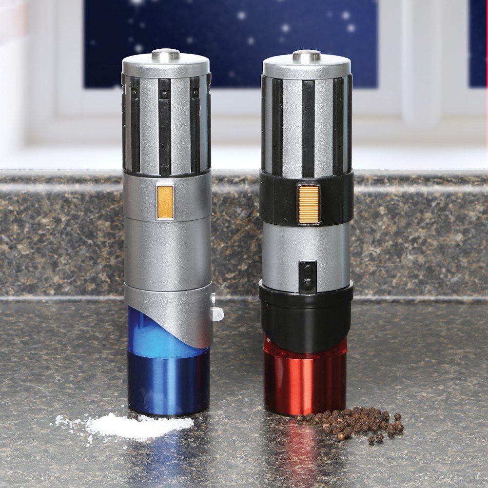 Uncanny Brands Star Wars Lightsaber salt pepper mills pack 2, gift-ready design for fans.