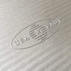 USA Pan bakeware fits standard ovens for cookies and sheet cakes