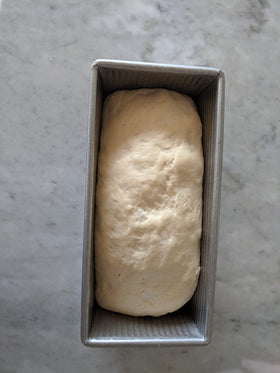 USA Pan Pullman loaf pan Americoat nonstick close-up for quick release of baked goods.