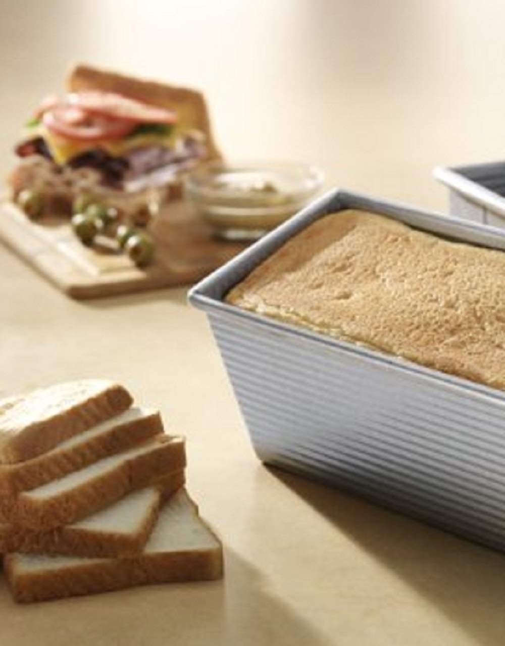 USA Pan Pullman loaf pan ridged texture promotes even air circulation for uniform crusts.