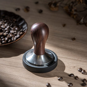 Base is dishwasher safe on the USEAMIE coffee tamper.