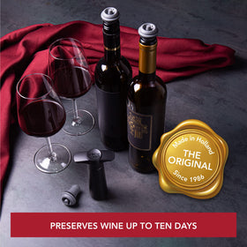 Vacu Vin gray stopper seals opened bottles for airtight storage.