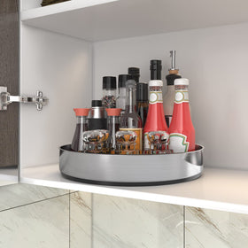VAEHOLD Lazy Susan in the fridge holds fruits and beverages neatly.