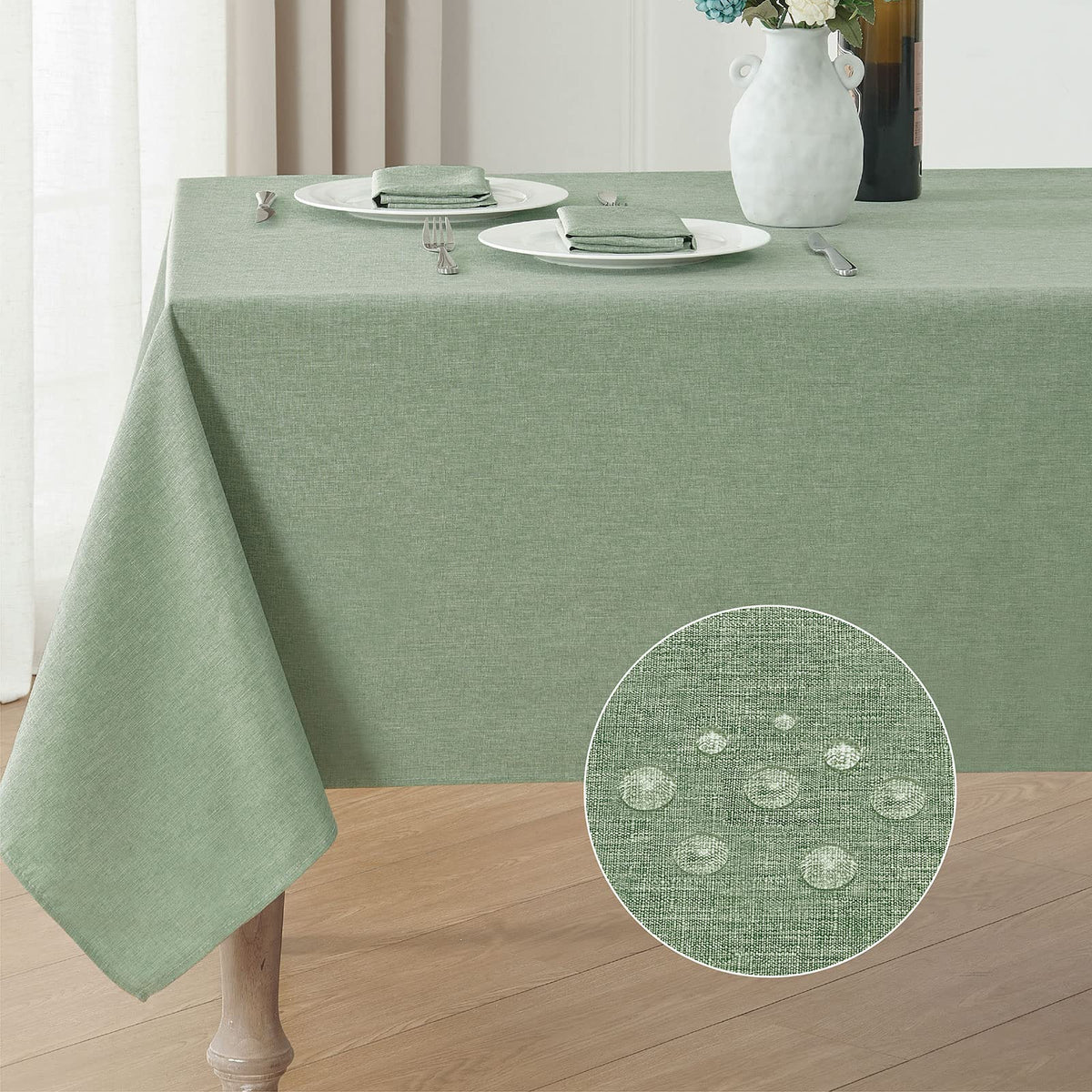 Veblandy sage-green rectangle tablecloth gracing a dining table for a polished setup.